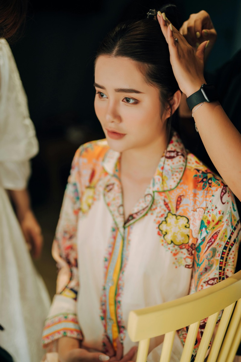 Client receiving professional hair styling at the salon